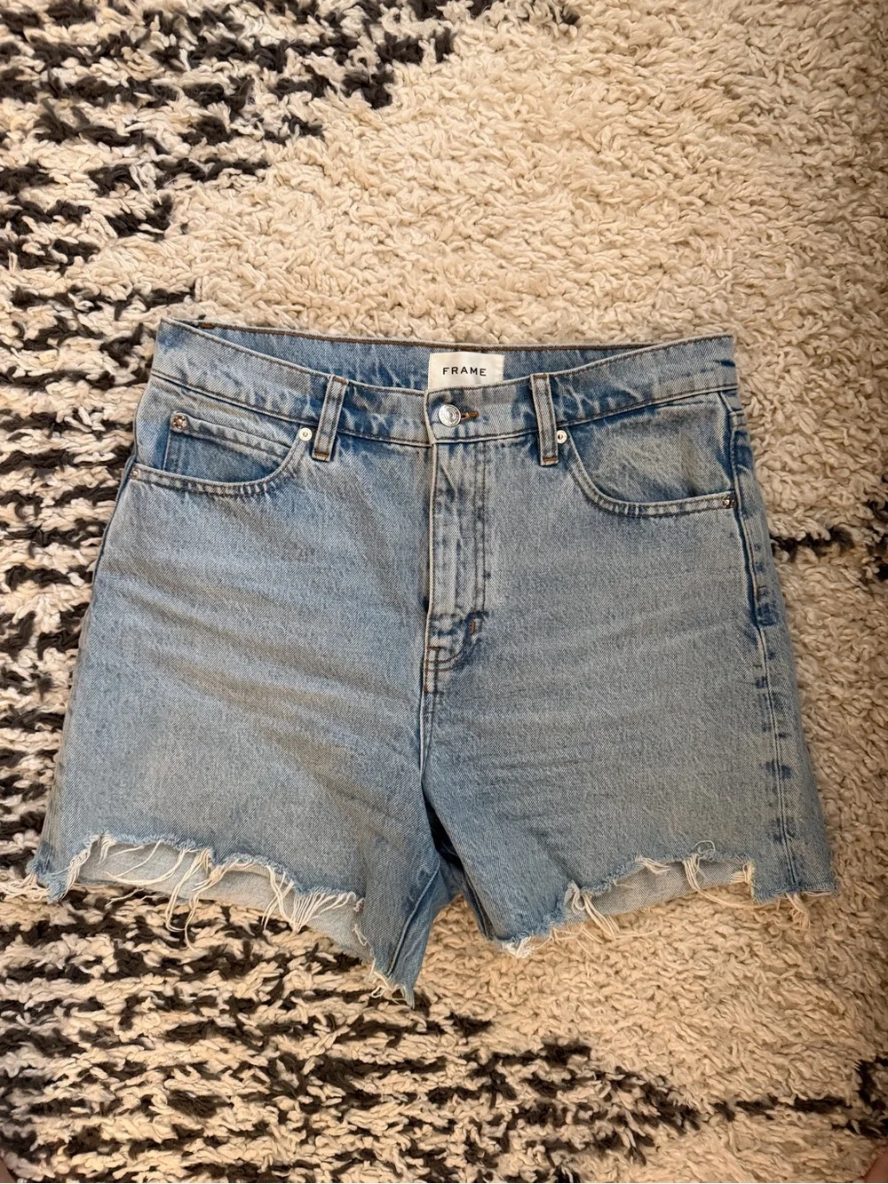 FRAME Denim The Easy Cutoff Shorts in Swindle